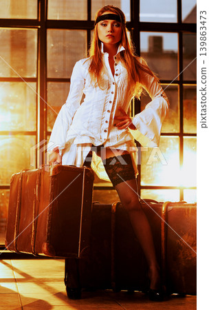 Sexy woman traveler at sunset light Sexy woman traveler at sunset light 139863473