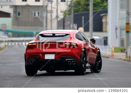 Italian-made red sports car Italian-made red sports car 139864101