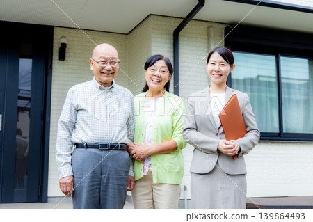 Senior couple viewing a property Senior couple viewing a property 139864493