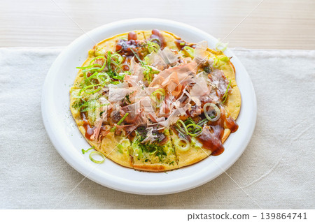 Okonomiyaki with lots of toppings (pork and squid) Okonomiyaki with lots of toppings (pork and squid) 139864741