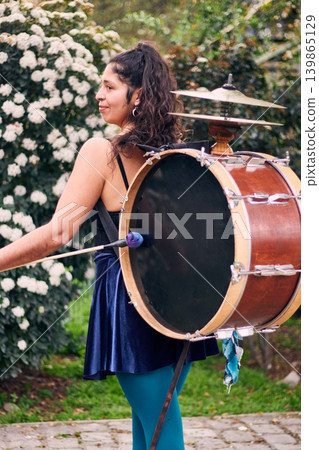 Detail of a musical instrument, bass drum and cymbals belonging to a chinchinera, a female street musician who dances and plays her drum in the streets. Chilean heritage, Chilean culture 139865129