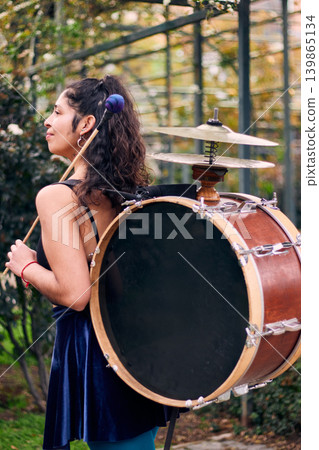 Detail of a musical instrument, bass drum and cymbals belonging to a chinchinera, a female street musician who dances and plays her drum in the streets. Chilean heritage, Chilean culture 139865134