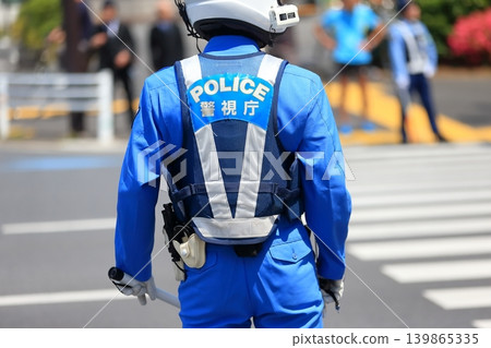 Police officers directing traffic (traffic police unit) Police officers directing traffic (traffic police unit) 139865335