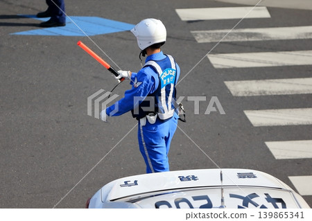 Police officers directing traffic (traffic police unit) Police officers directing traffic (traffic police unit) 139865341