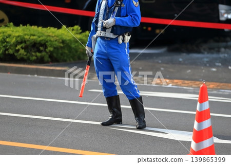 Police officers directing traffic (traffic police unit) Police officers directing traffic (traffic police unit) 139865399