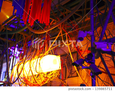 Tangled Cables And Glowing Industrial Lighting 139865711