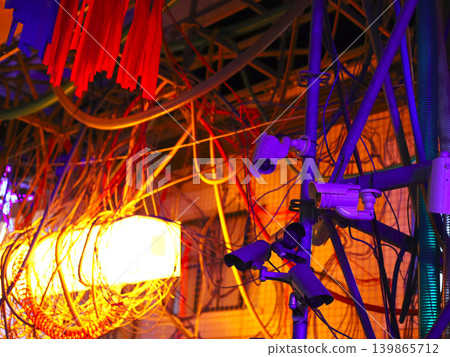 Surveillance Gear Amid Tangled Electrical Wiring Surveillance Gear Amid Tangled Electrical Wiring 139865712