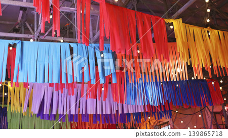 Colorful Festive Streamers Hanging from Ceiling Colorful Festive Streamers Hanging from Ceiling 139865718