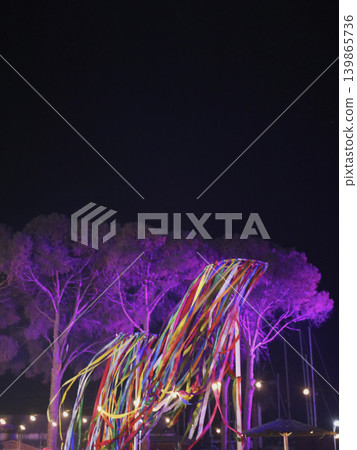 Colorful Ribbon Sculpture Under Night Sky 139865736
