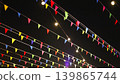Colorful Bunting and Lights Overhead at Night 139865744