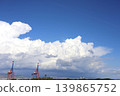 Dramatic Blue Sky Over Industrial Port Cranes 139865752
