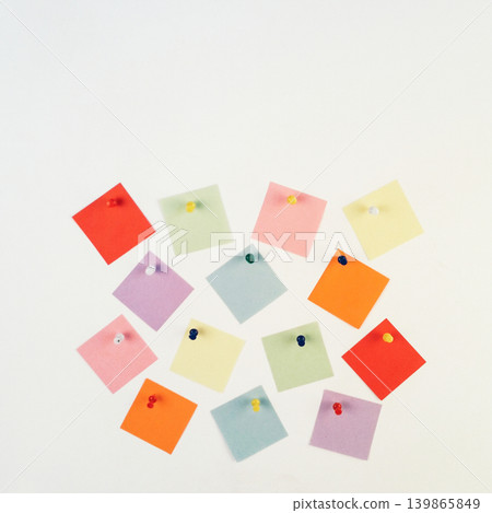 Colorful Sticky Notes Pinned to a White Background Colorful Sticky Notes Pinned to a White Background 139865849