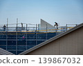 Apartment building construction site and workers 139867032