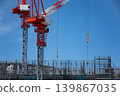 Tower crane at a high-rise construction site 139867035