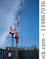 Tower crane at a high-rise construction site 139867036