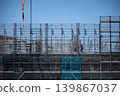 High-rise construction site and workers 139867037