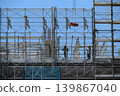 High-rise construction site and workers 139867040