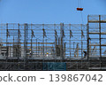 High-rise construction site and workers 139867042