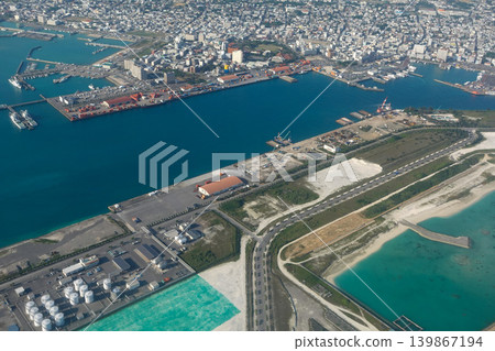 [Ishigaki Island] View of the city and coral reefs from above Ishigaki Port 139867194