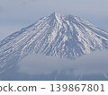 Snow-covered Mt. Fuji above the clouds 139867801