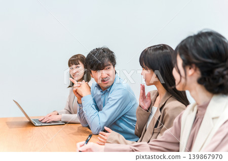 Businessmen and HR personnel (men and women) conducting interviews and meetings. Businessmen and HR personnel (men and women) conducting interviews and meetings. 139867970