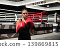 Horizontal Medium Shot of Female Boxer in Ring 139869815