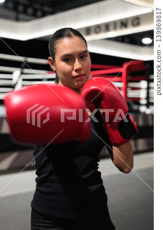 Close Up of Female Boxer Punching Towards Camera Close Up of Female Boxer Punching Towards Camera 139869817