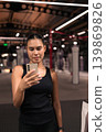 Female Athlete Using Smartphone in Vertical Shot 139869826