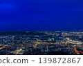 The night view of Kitakyushu, where lights begin to come on in the deep blue twilight as seen from Mt. Sarakura in Fukuoka Prefecture. The night view of Kitakyushu, where lights begin to come on in the deep blue twilight as seen from Mt. Sarakura in Fukuoka Prefecture. 139872867