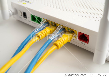 Ethernet cable with wireless router connect to internet service provider network. Ethernet cable with wireless router connect to internet service provider network. 139875127