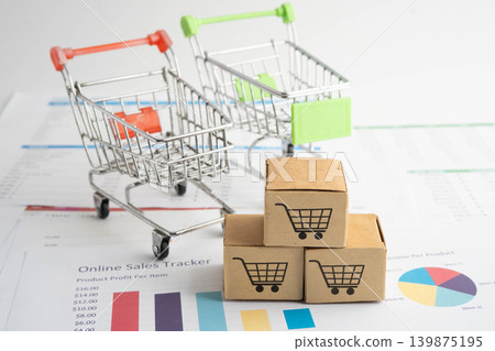 Online shopping, Shopping cart box on business graph, import export, finance commerce. Online shopping, Shopping cart box on business graph, import export, finance commerce. 139875195