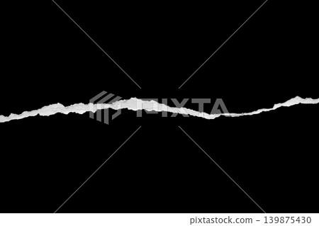 Ripped torn paper edges isolated on black background Ripped torn paper edges isolated on black background 139875430