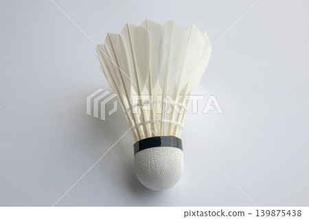 feather badminton shuttlecock on white paper texture background feather badminton shuttlecock on white paper texture background 139875438