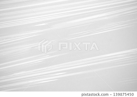 Abstract white plastic film wrap texture background Abstract white plastic film wrap texture background 139875450