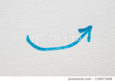 hand drawn arrow with blue marker pen on white background hand drawn arrow with blue marker pen on white background 139875686