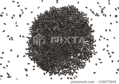 Black sesame seeds isolated on white background Black sesame seeds isolated on white background 139875698