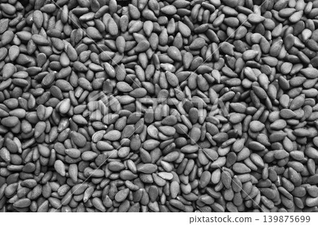 Black sesame seeds texture background close up Black sesame seeds texture background close up 139875699