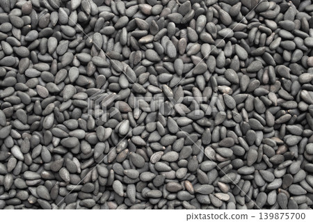 Black sesame seeds texture background close up Black sesame seeds texture background close up 139875700