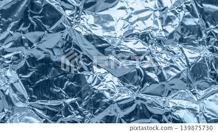 Shiny metallic blue foil crumpled texture background Shiny metallic blue foil crumpled texture background 139875730