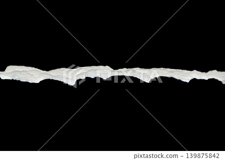 Ripped torn paper edges isolated on black background Ripped torn paper edges isolated on black background 139875842