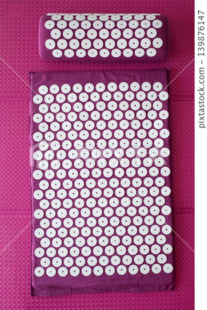 Close up of acupressure mat spikes. Alternative china medicine. Close up of acupressure mat spikes. Alternative china medicine. 139876147