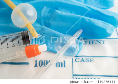 Foley catheter and urine drainage bag collect urine for disability or patient in hospital. Foley catheter and urine drainage bag collect urine for disability or patient in hospital. 139876313