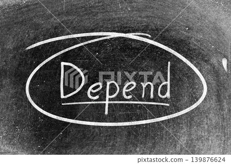 White chalk hand writing in word depend and circle shape on blackboard background 139876624
