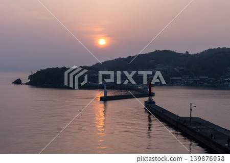 Hagi Fishing Port at dusk (breakwater, lighthouse, calm sea) Hagi Fishing Port at dusk (breakwater, lighthouse, calm sea) 139876958