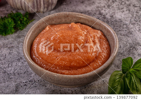 Fish roe spread in rustic ceramic bowl with fresh herbs Fish roe spread in rustic ceramic bowl with fresh herbs 139877092