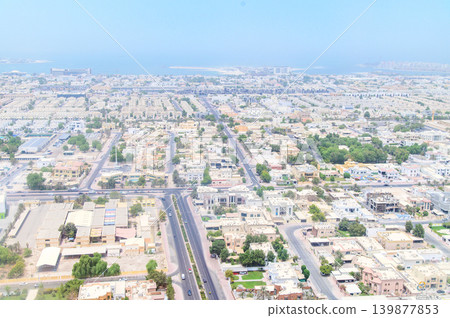 A stunning view of Dubai from the sky. A stunning view of Dubai from the sky. 139877853