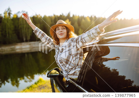 Road trip travel, woman and car window freedom to relax in summer, outdoor adventure. Active life. Road trip travel, woman and car window freedom to relax in summer, outdoor adventure. Active life. 139877965