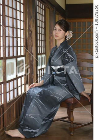 A young woman in a yukata A young woman in a yukata 139878250