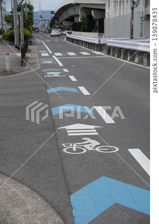 Bicycle navigation lines painted on the side of the road Bicycle navigation lines painted on the side of the road 139878435