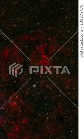 Red luminous gas and dark dust clouds create intricate patterns among scattered bright stars across the vast cosmos. Red luminous gas and dark dust clouds create intricate patterns among scattered bright stars across the vast cosmos. 139878470